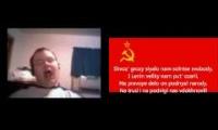 Fat guy singing the national anthem of the USSR